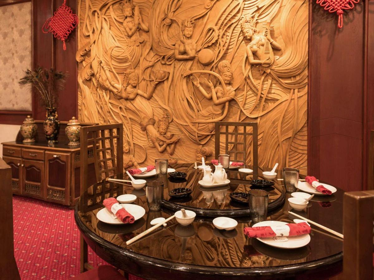 グランド ホテル メルキュール アルジェ エアロポート Dar el Beïda エクステリア 写真 A table set for dim sum