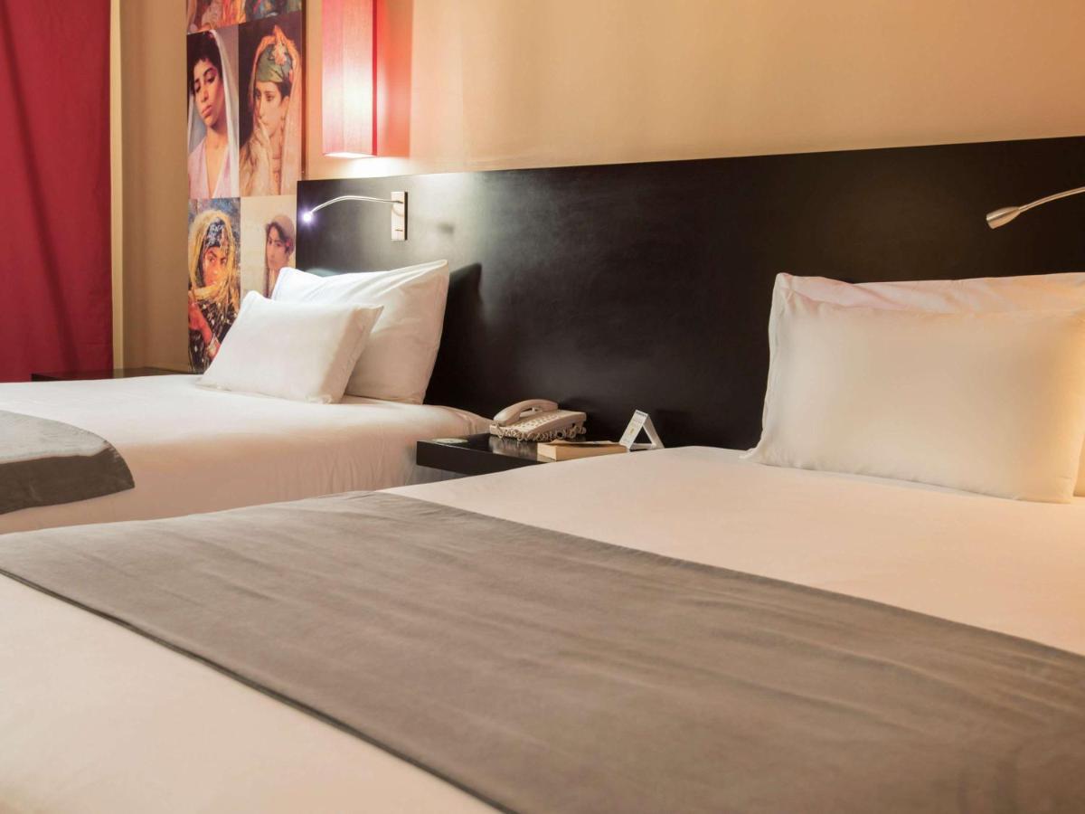 グランド ホテル メルキュール アルジェ エアロポート Dar el Beïda エクステリア 写真 A room at the hotel